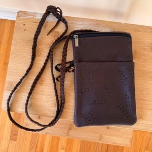 Compact leather crossbody pouch in rich chocolate brown